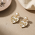 Gold Pearl Heart Bow Stud Earrings