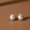 Ivory Pearl Wave Studs