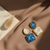 Ocean Glow Geometric Drop Earrings