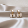 Pearl Bow Charm Studs