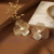Golden Bloom Pearl Statement Earrings