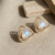 Luminous Pearl Triangle Stud Earrings (Anti-Tarnish)